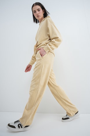 Puma Pantaloni din reiat cu logo ESS ELEVATED, Galben pai