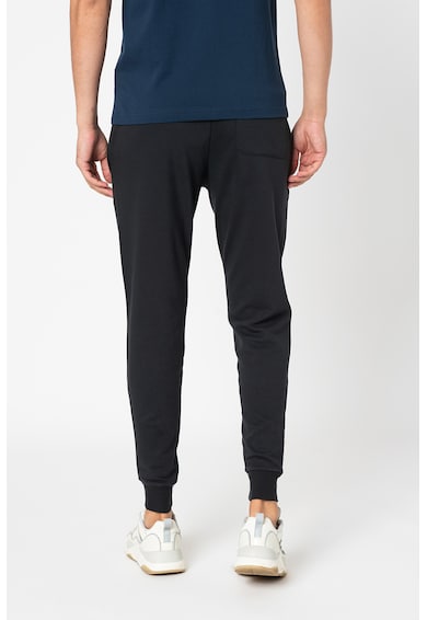 New Balance Спортен панталон Essentials с бродерии Мъже