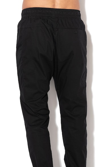 Nike Pantaloni sport conici cu snur Barbati