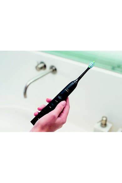 Philips Sonicare Periuta electrica sonica  DiamondClean HX9911/27, 62000 miscari/minut, 4 moduri de curatare, 3 intensitati, conectivitate la aplicatie, senzor presiune, functie BrushSync, 1 cap de periere, toc de transport, pahar de incarcare Femei