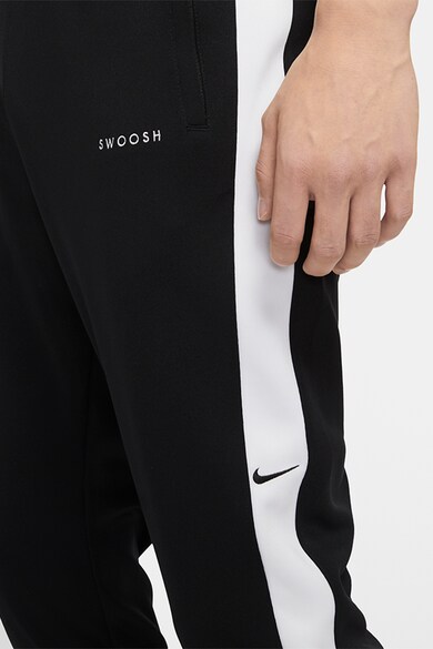 Nike Pantaloni sport conici Swoosh Barbati