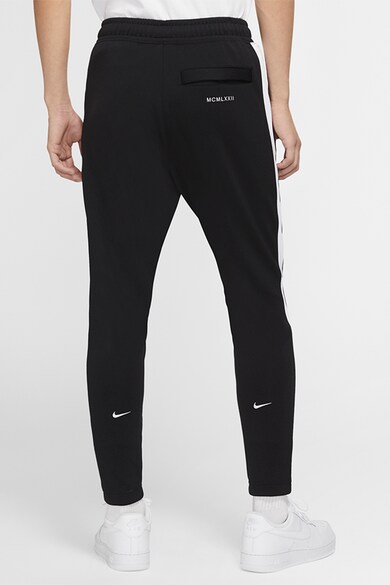 Nike Pantaloni sport conici Swoosh Barbati
