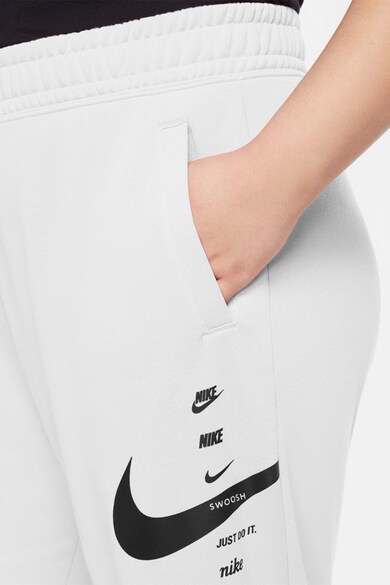 Nike Pantaloni sport Swoosh Femei