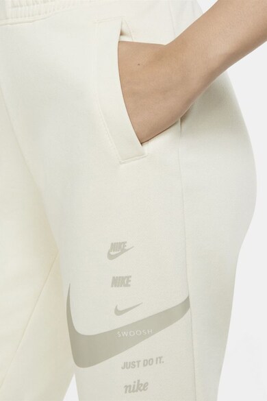 Nike Pantaloni sport Swoosh Femei