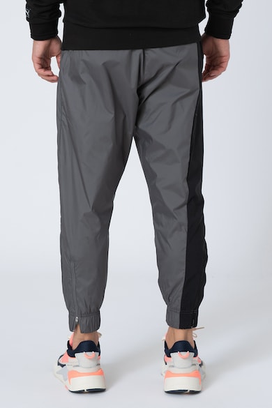 Puma Pantaloni regular fit de trening Collective Barbati