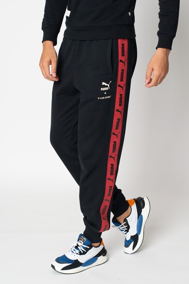 Puma Pantaloni sport conici cu benzi laterale cu logo Barbati