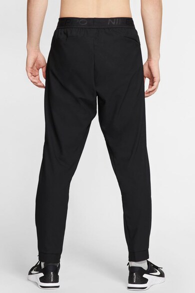 Nike Pantaloni conici pentru fitness Barbati
