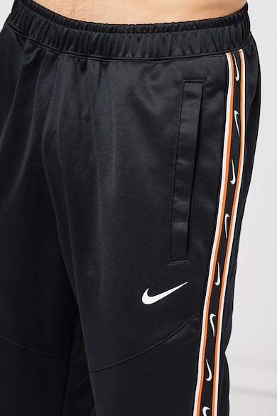 Nike Pantaloni sport cu banda logo contrastanta Repeat Barbati