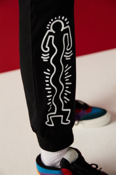 Penti Pantaloni sport cu imprimeu grafic Femei