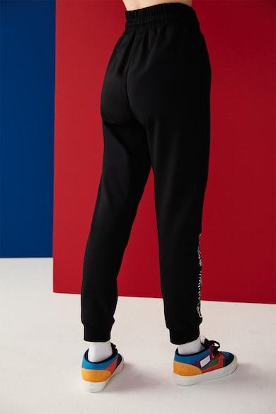 Penti Pantaloni sport cu imprimeu grafic Femei