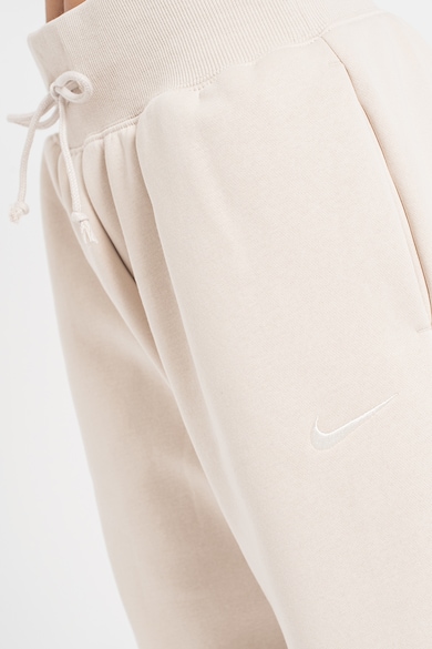 Nike Phoenix bő fazonú szabadidőnadrág logós részlettel női