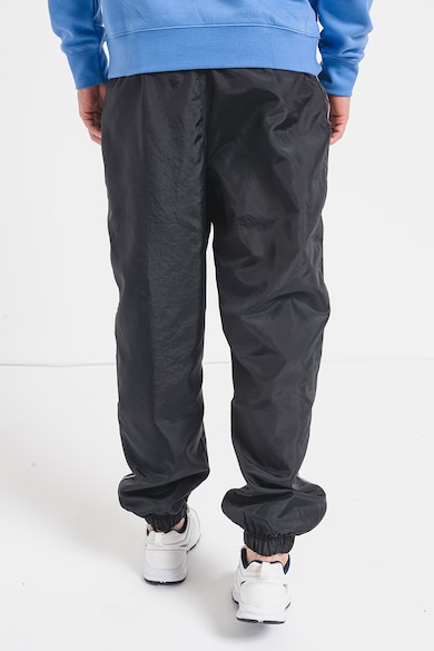 Nike Спортен панталон със свободна кройка и джобове Мъже