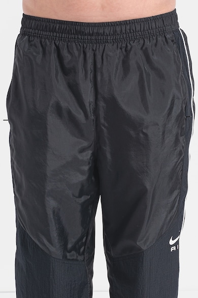 Nike Pantaloni de trening relaxed fit cu buzunare laterale Barbati