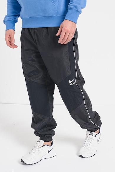 Nike Pantaloni de trening relaxed fit cu buzunare laterale Barbati