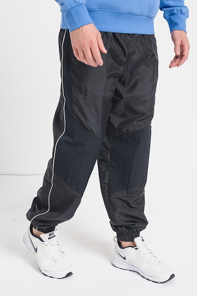 Nike Спортен панталон със свободна кройка и джобове Мъже