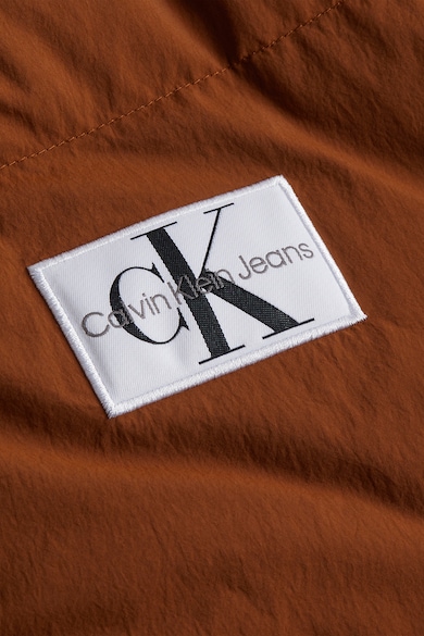 CALVIN KLEIN JEANS Pihével bélelt télikabát magas gallérral női