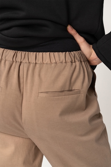 UNDRESS Amo középmagas derekú lyocelltartalmú nadrág pliszírozott részletekkel női