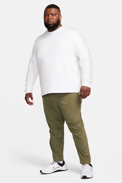 Nike Pantaloni conici cu tehnologie Dri-FIT si slituri cu fermoar Unlimited Barbati