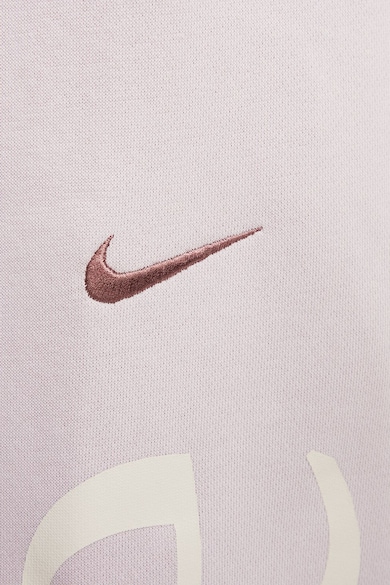 Nike Szűkülő szárú szabadidőnadrág ferde zsebekkel női