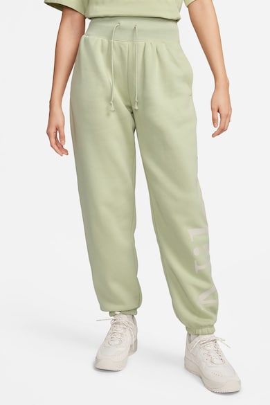 Nike Спортен панталон със стеснен крачол и скосени джобове Жени