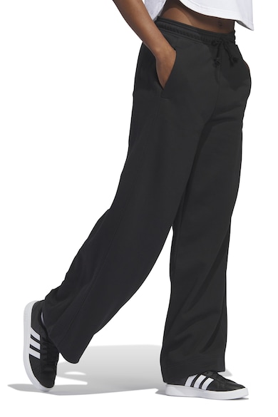 adidas Sportswear Pantaloni de trening din amestec de bumbac cu croiala ampla Femei