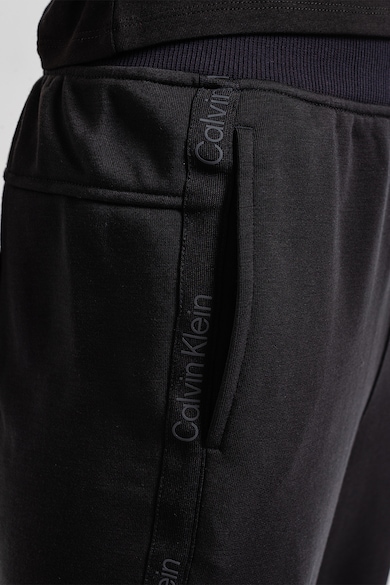 CALVIN KLEIN Спортен панталон с лента с лого Жени