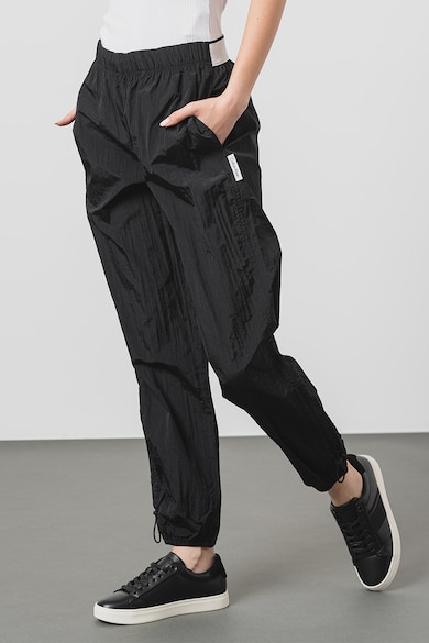 CALVIN KLEIN Kényelmes fazonú nadrág logós rugalmas derékrésszel női