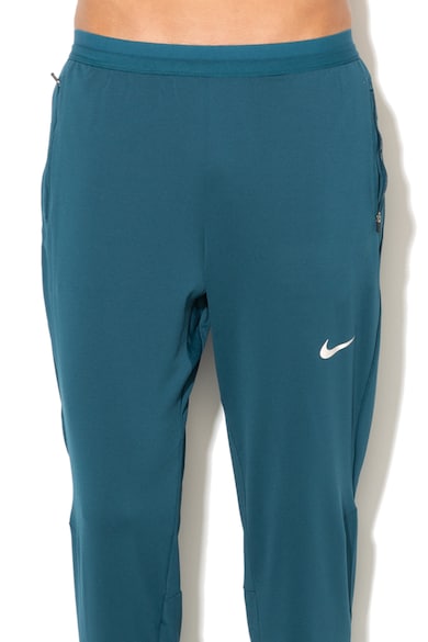 Nike Спортен панталон с лого и джобове с цип6 Мъже