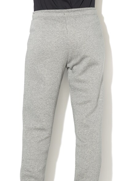 Nike Pantaloni sport cu captuseala din fleece si buzunare oblice Femei