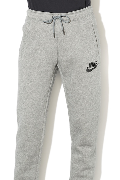 Nike Pantaloni sport cu captuseala din fleece si buzunare oblice Femei