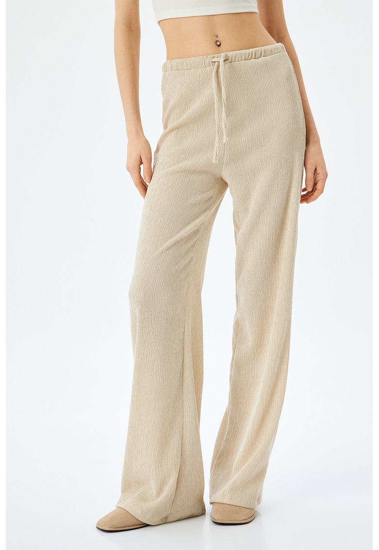 Pantaloni uni evazati - Bej