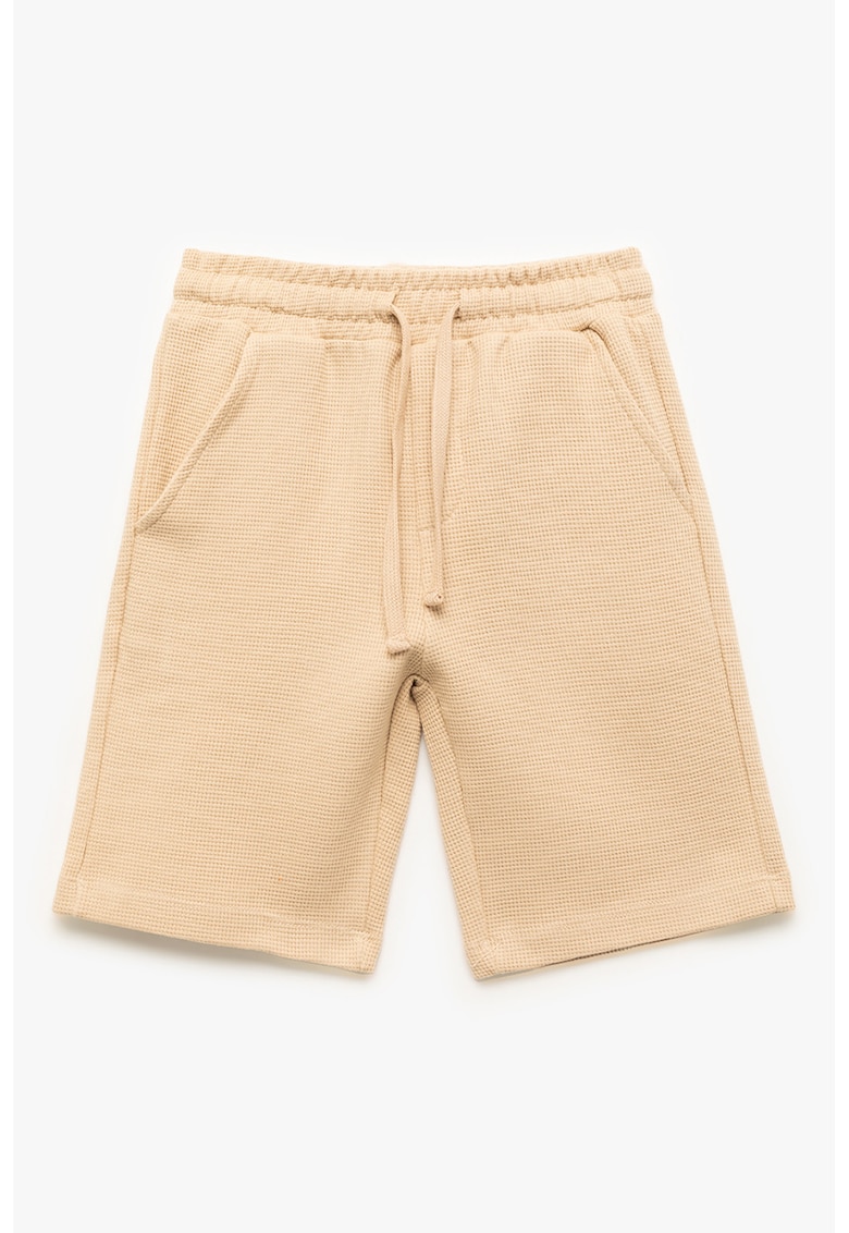 Pantaloni scurti texturati cu buzunare oblice