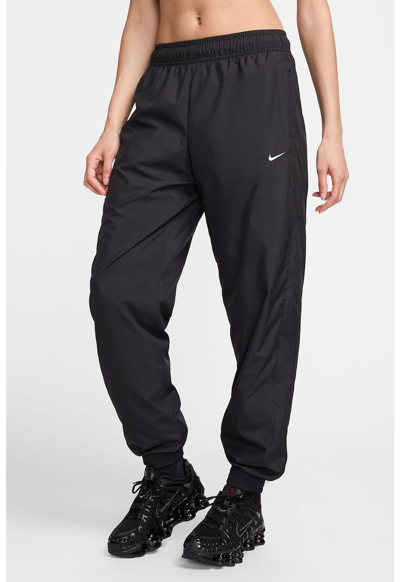 Pantaloni conici