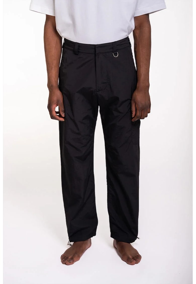 -Pantaloni regular fit - cu buzunar dublu lateral și elastic ajustabil la glezne - Negru