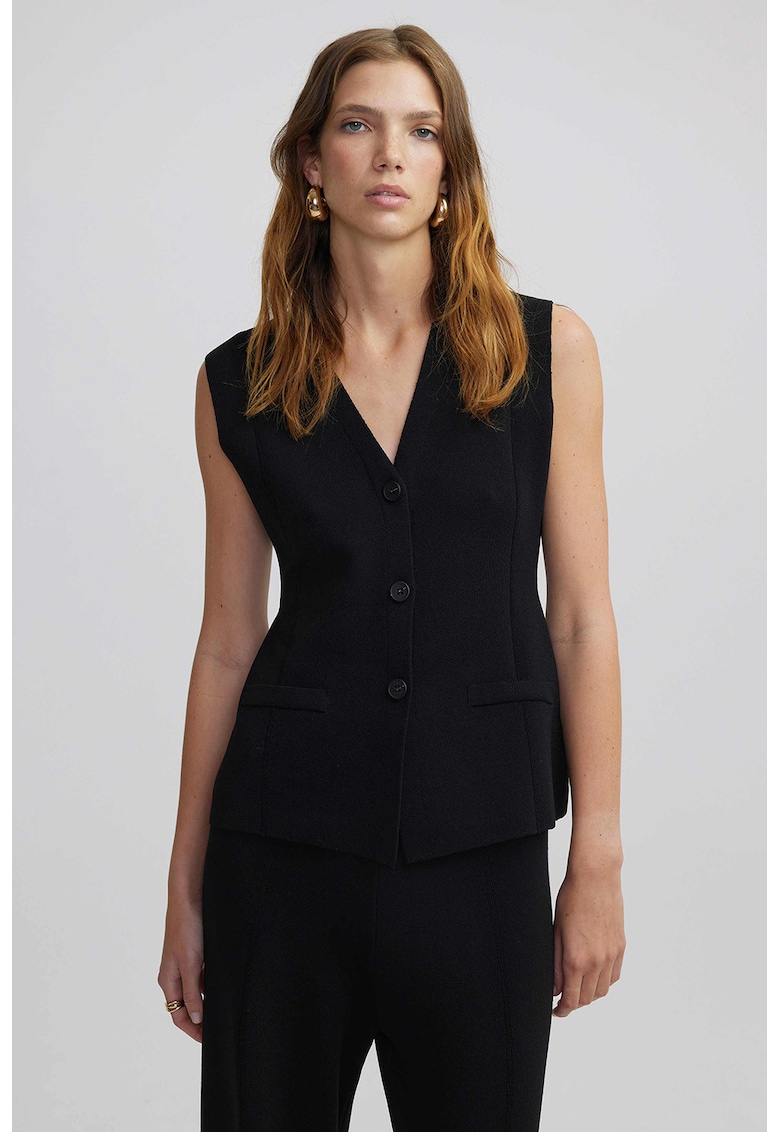 Vesta tricotata fin cu nasturi