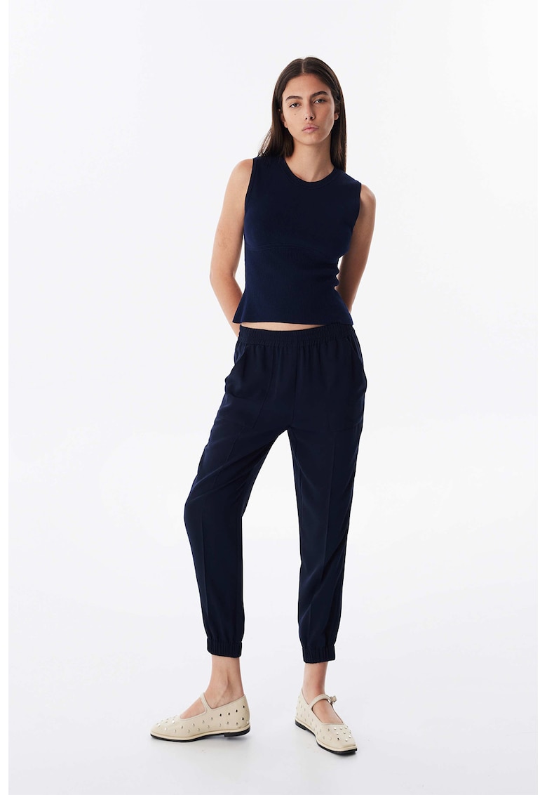 Pantaloni conici cu talie medie