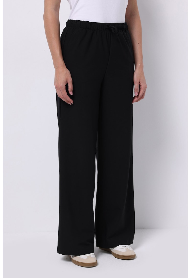 Pantaloni ampli cu snur