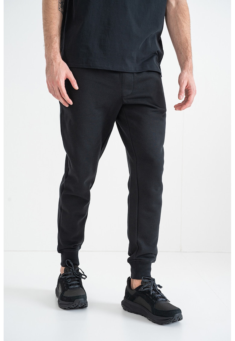 Pantaloni de trening cu talie medie si buzunare laterale