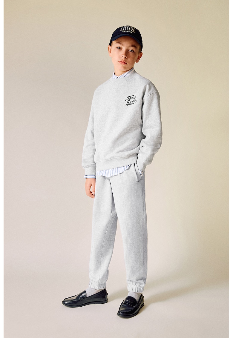 Pantaloni cu croiala conica si snur de ajustare