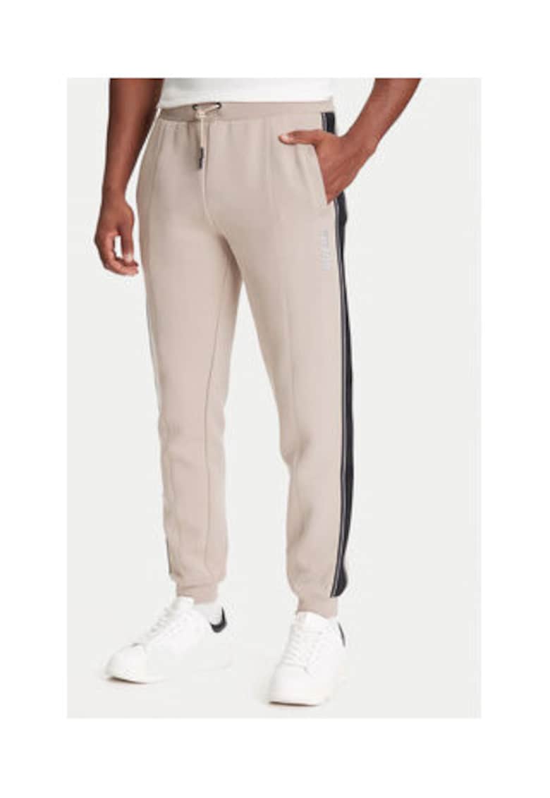Pantaloni de trening din amestec de bumbac cu benzi laterale contrastante si logo cu aspect metalizat