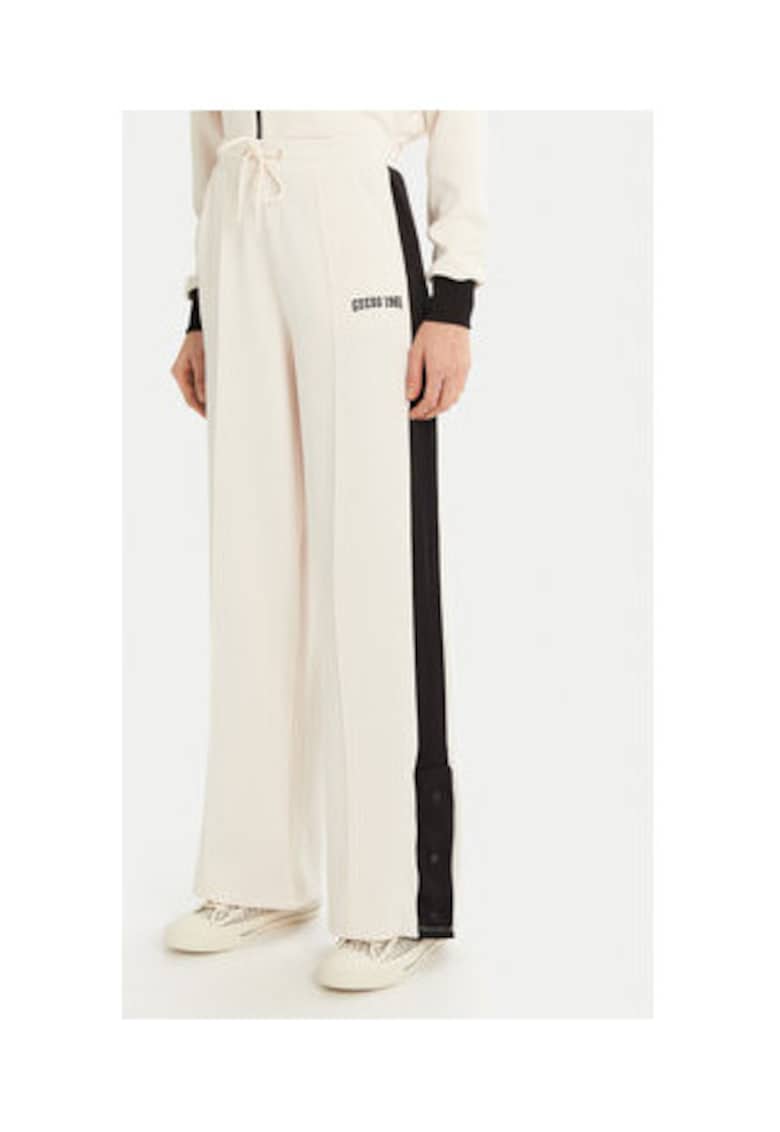 Guess Pantaloni de trening din amestec de poliester cu croiala evazata si banda logo -