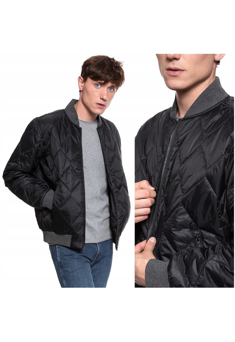 Jacheta De Tranzitie -  Jacheta Bomber - Croiala Normala - Inchidere: Fermoar - Compozitie Material: 100% Poliamida - Numar De Buzunare: 2 - Negru