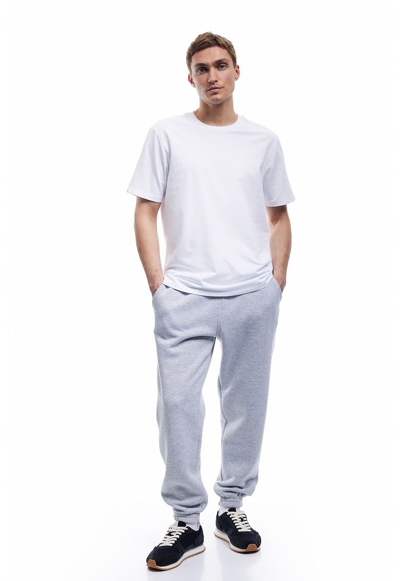 Pantaloni de trening din amestec de bumbac cu buzunare laterale Pantaloni de trening din amestec de bumbac cu buzunare laterale