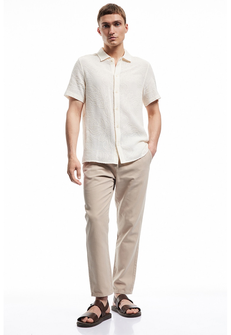 Pantaloni conici de bumbac cu buzunare laterale