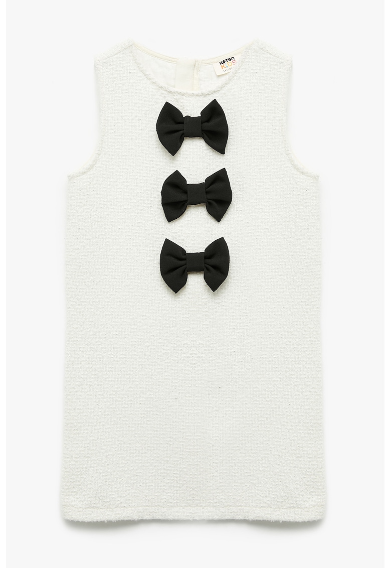 Rochie cu aspect texturat si aplicatii din funda