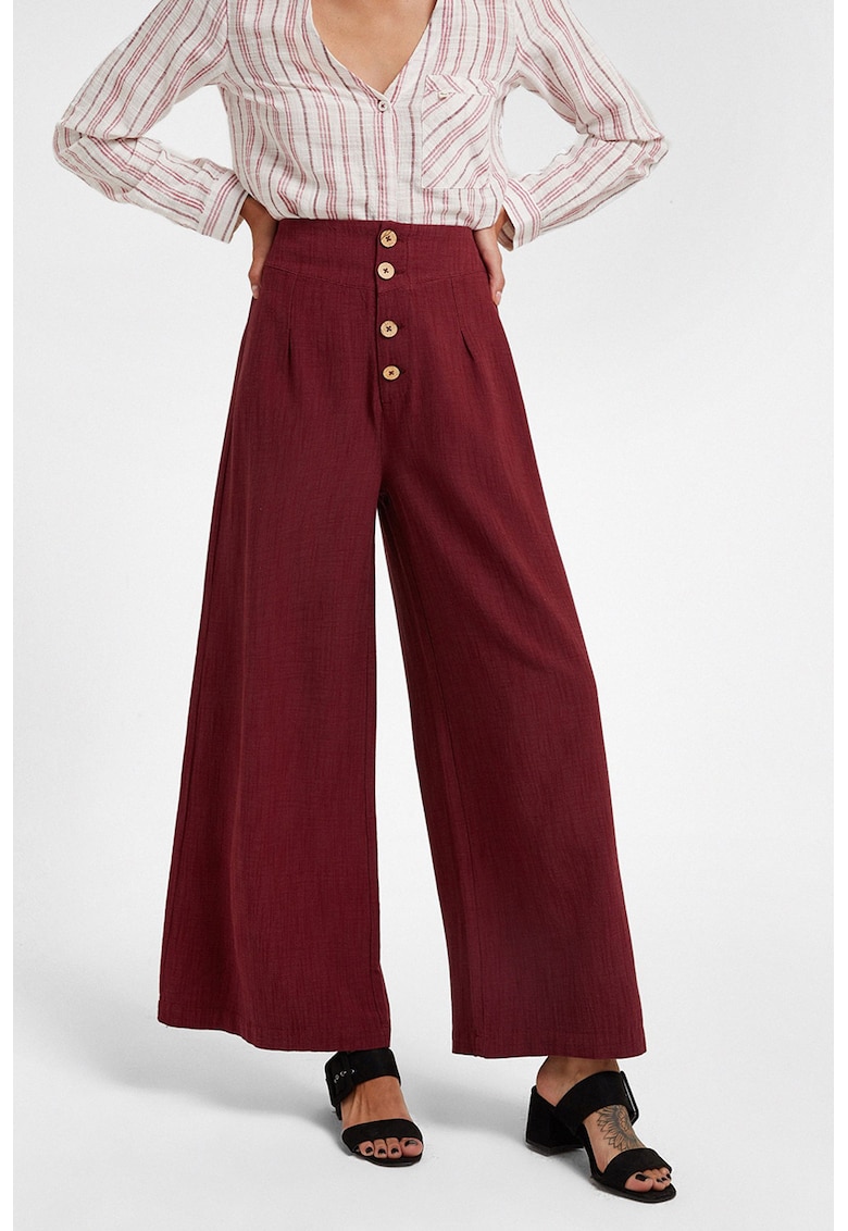 Pantaloni crop evazati cu nasturi