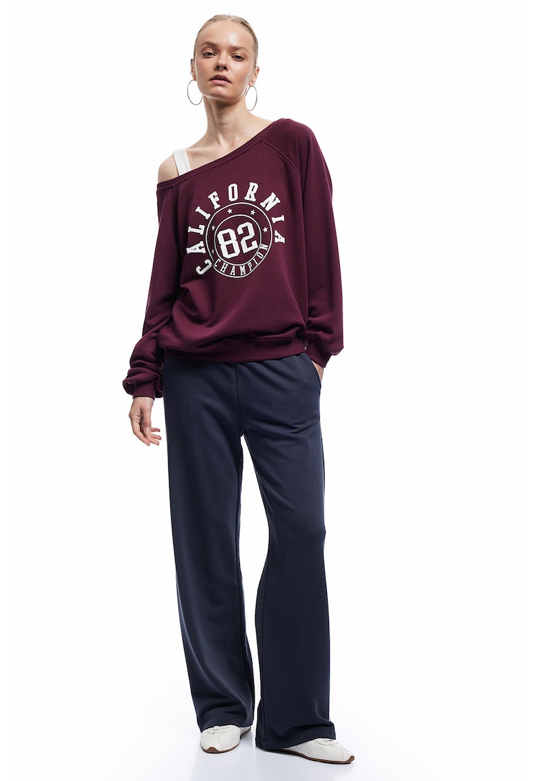 Pantaloni de trening cu croiala ampla si model uni Pantaloni de trening cu croiala ampla si model uni