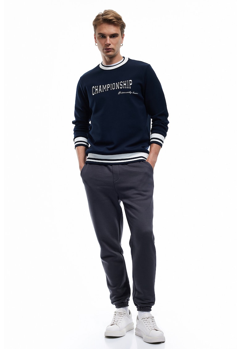 Pantaloni de trening conici cu terminatii elastice