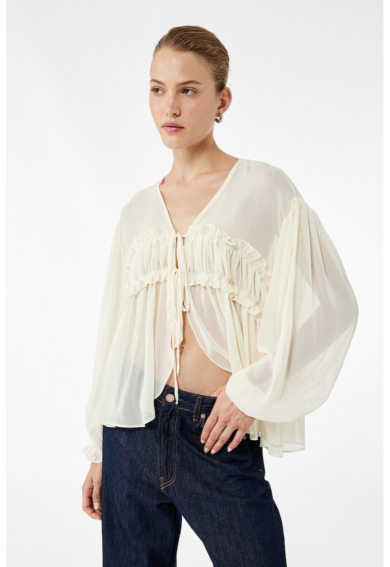 Bluza semitransparenta cu decolteu in V