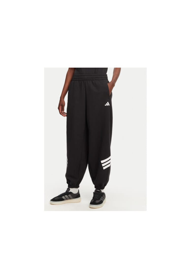 Pantaloni largi cu buzunare laterale